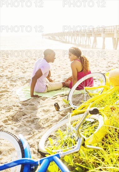 Young couple relaxing on beach