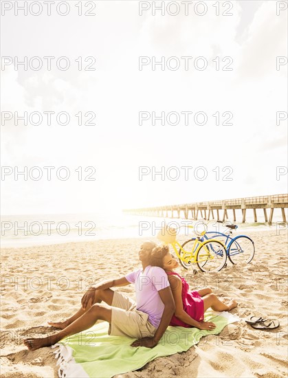 Young couple relaxing on beach