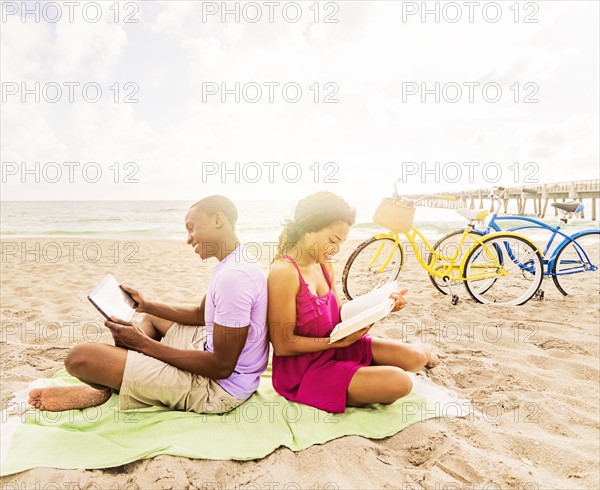 Young couple relaxing on beach