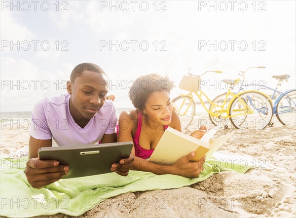 Young couple relaxing on beach