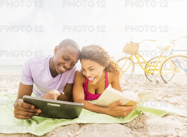 Young couple relaxing on beach