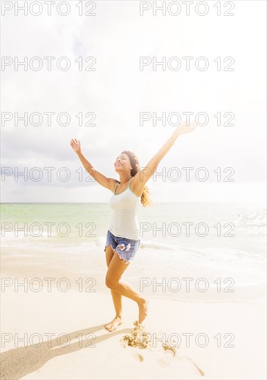 Happy woman on beach