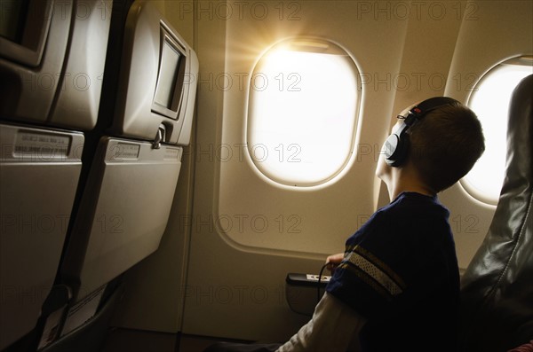 Boy (6-7) in plane