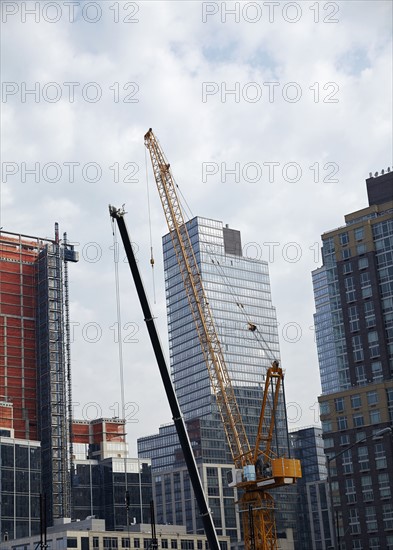 Cranes in urban scene