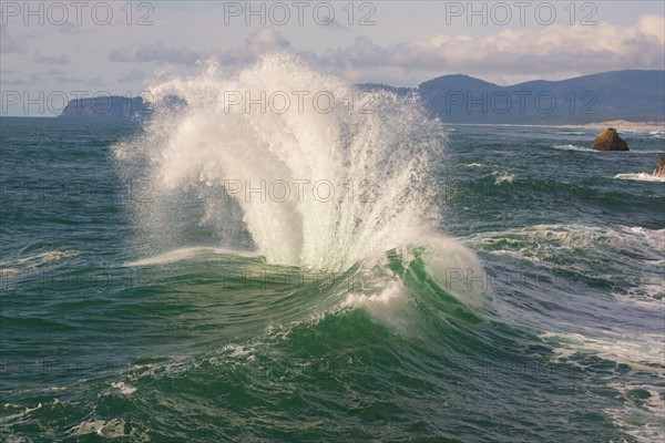 Wave splashing on rock