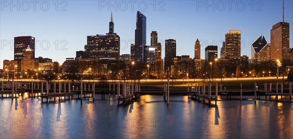 Skyline at dusk seen from marina