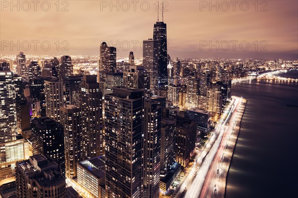 Elevated view of Lake Shore Drive and Chicago architecture at sunset