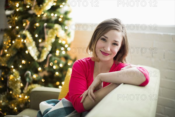 Portrait of young woman relaxing at Christmas time