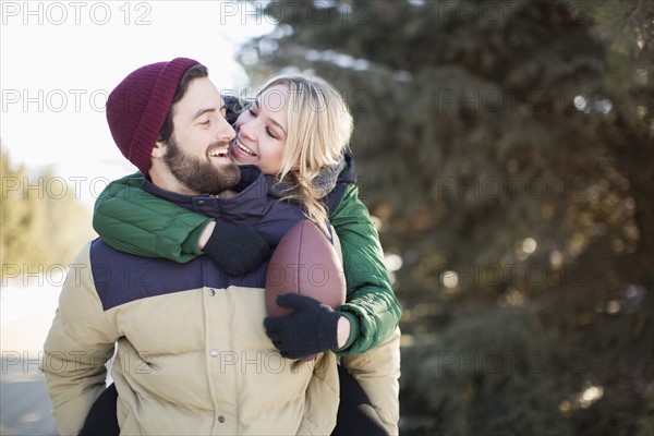 Couple embracing outdoors