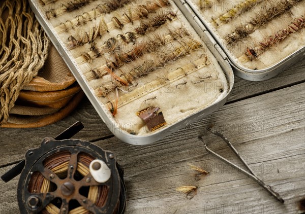 Studio shot of antique fly fishing set.