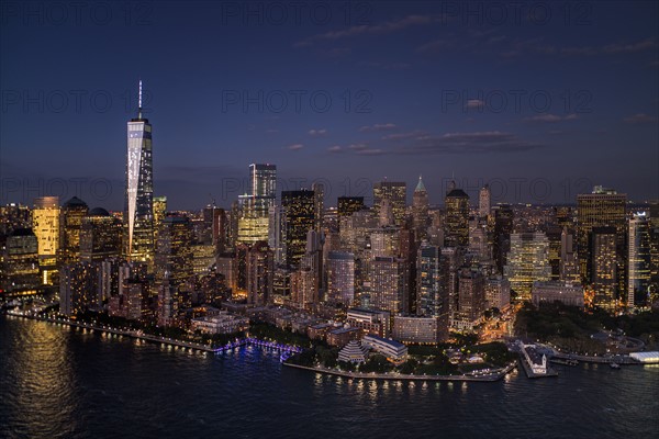 Aerial view of city with Freedom tower at night. New York City, New York.