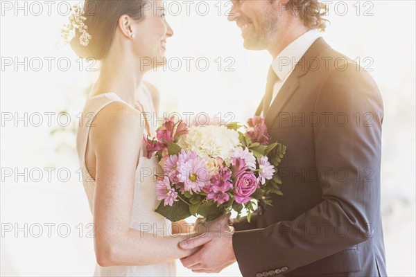 Bride and groom celebrating their wedding.