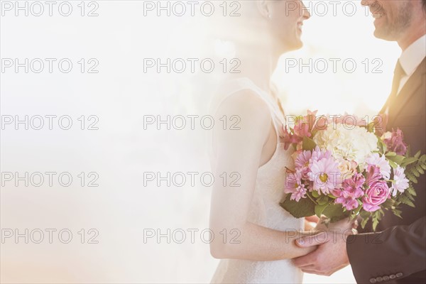 Bride and groom celebrating their wedding.