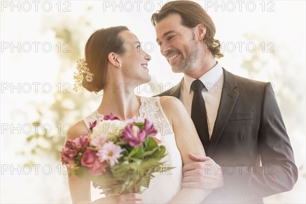 Bride and groom celebrating their wedding.