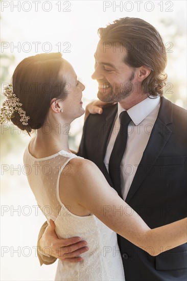 Bride and groom dancing.