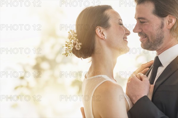 Bride and groom dancing.