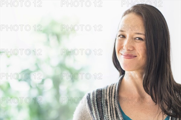 Portrait of smiling brunette.