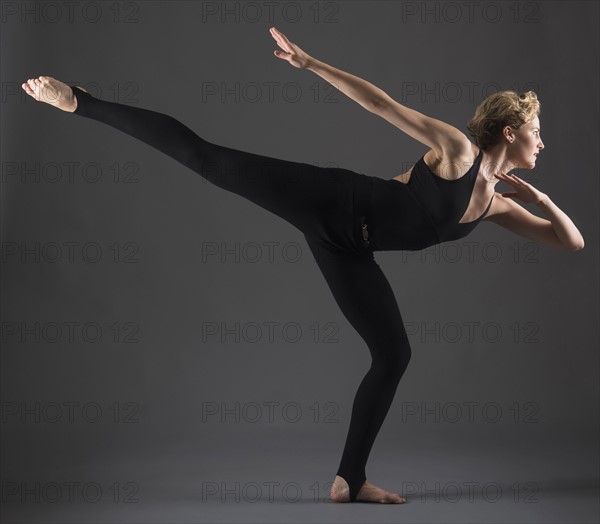 Studio shot of female ballet dancer.