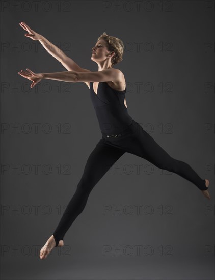 Studio shot of female ballet dancer.