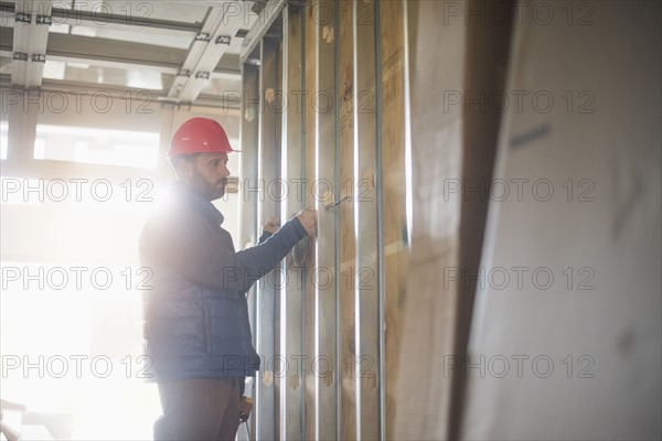 Man working at construction site.