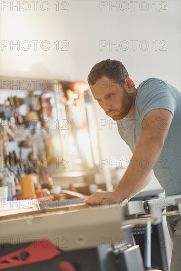 Man working in workshop.