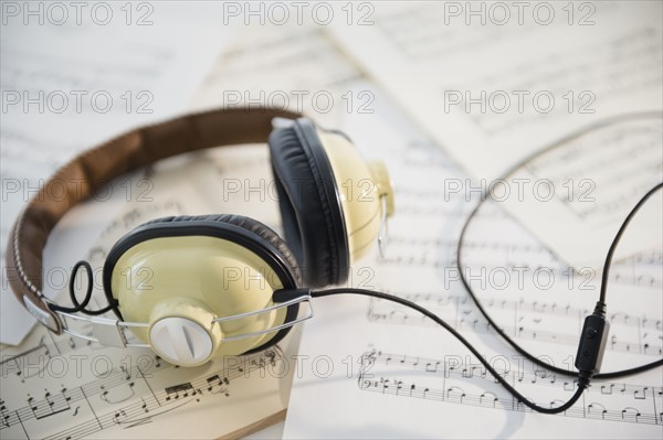 Headphones and music sheets