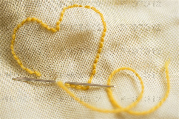 Stitched yellow heart