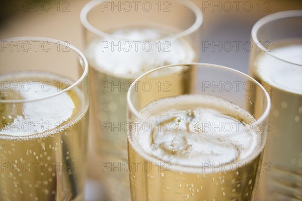 Elevated view of champagne flutes
