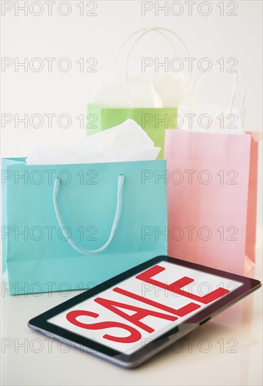 Digital tablet and shopping bags