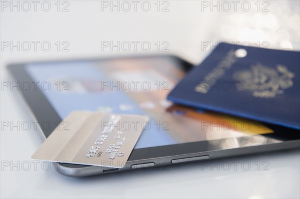 Credit card, passport and digital tablet