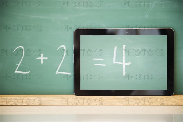 Result of simple addition displayed on tablet