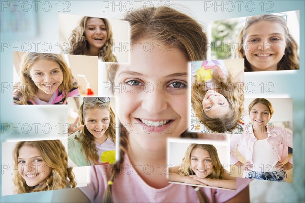 Girl (12-13) surrounded by photos of herself