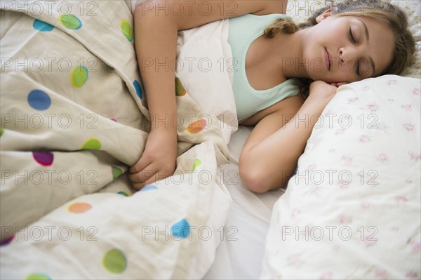 Girl (12-13) sleeping