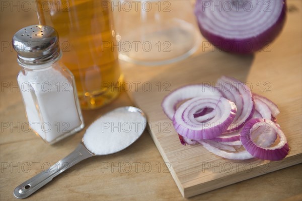 Studio shot of red onion and salt