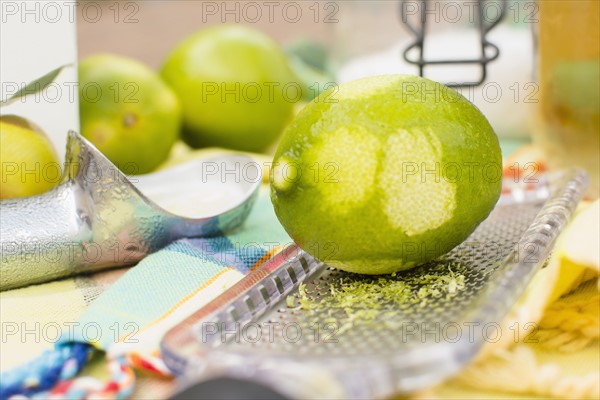 Studio shot of lime and grater