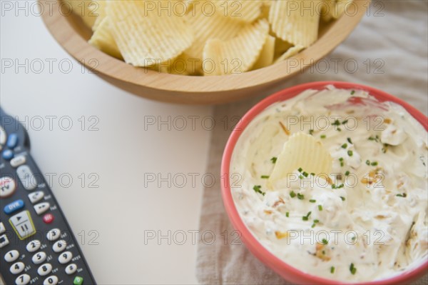 Studio shot of crisps and onion dip