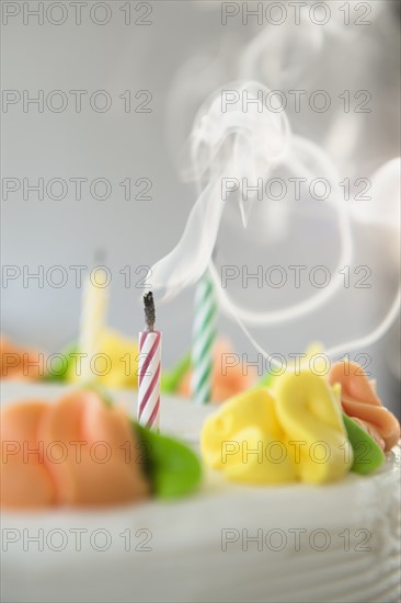 Studio shot of blown off candles on cake