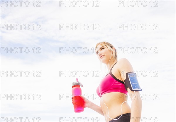 Woman drinking water from bottle