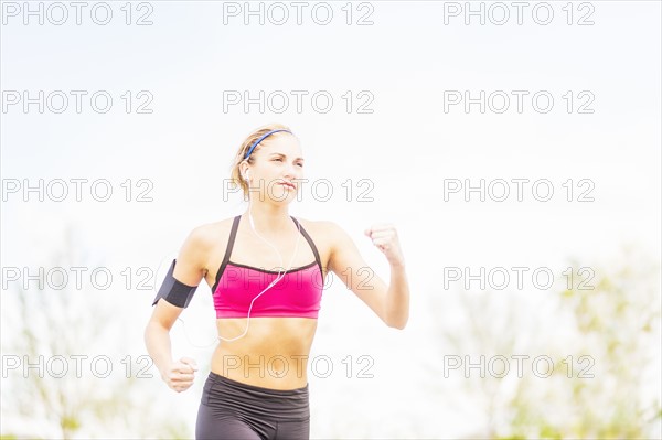 Young woman jogging in park