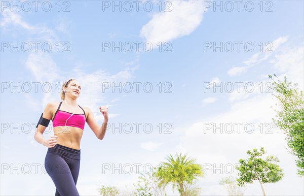 Young woman jogging in park