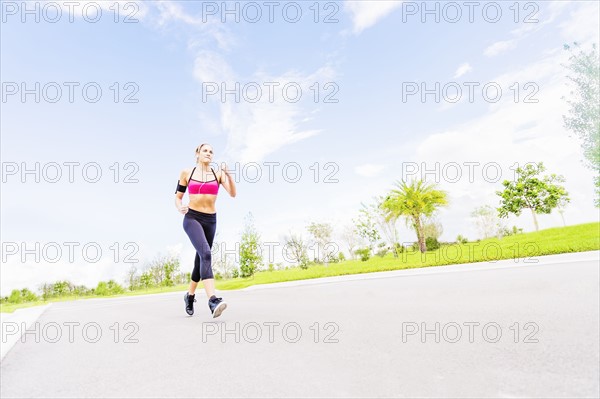 Young woman jogging in park