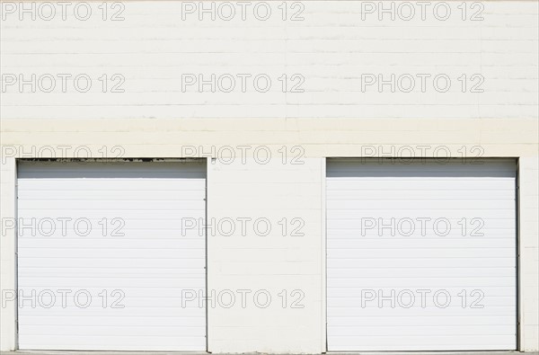 Close-up shot of closed roller doors of warehouse
