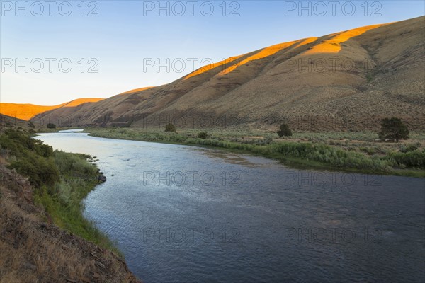 River at foot of hills