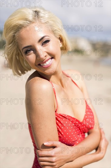 Portrait of woman wearing red swimsuit