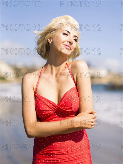 Portrait of blond woman on beach