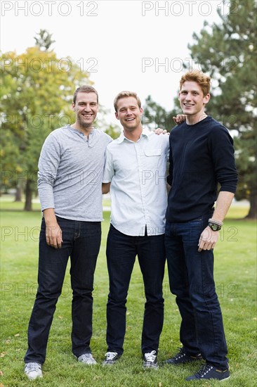 Portrait of young men in park