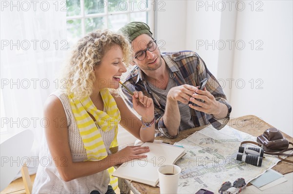 Couple making plans for travel.