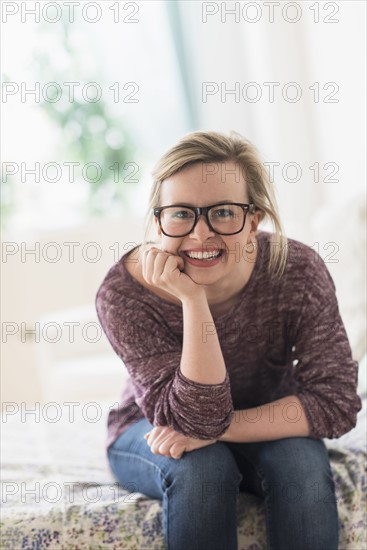 Portrait of smiling young woman.