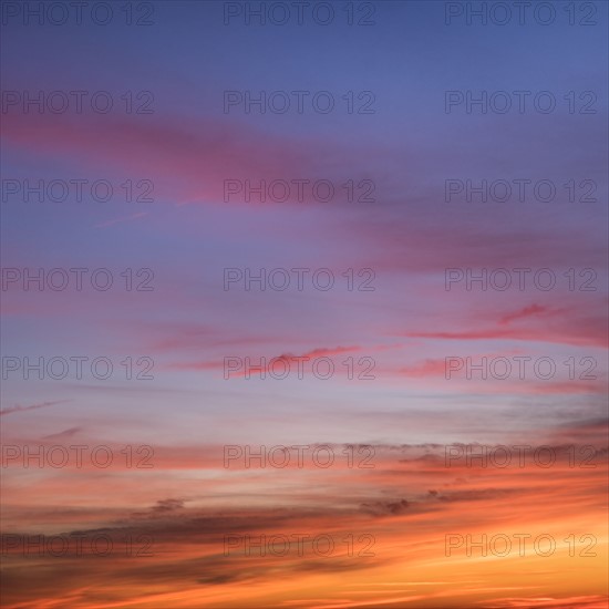 Sunrise sky with clouds.