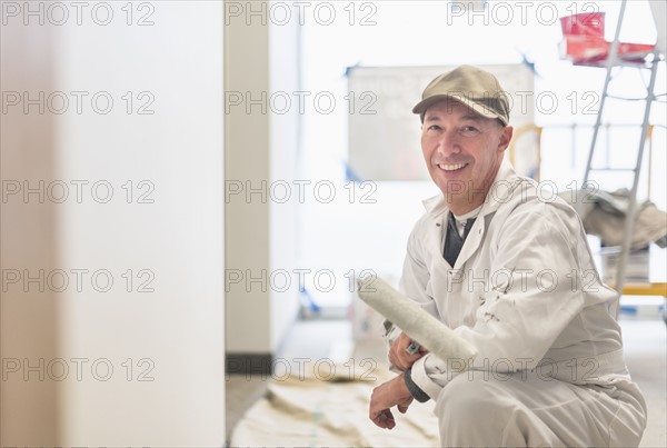 Portrait of smiling manual worker.